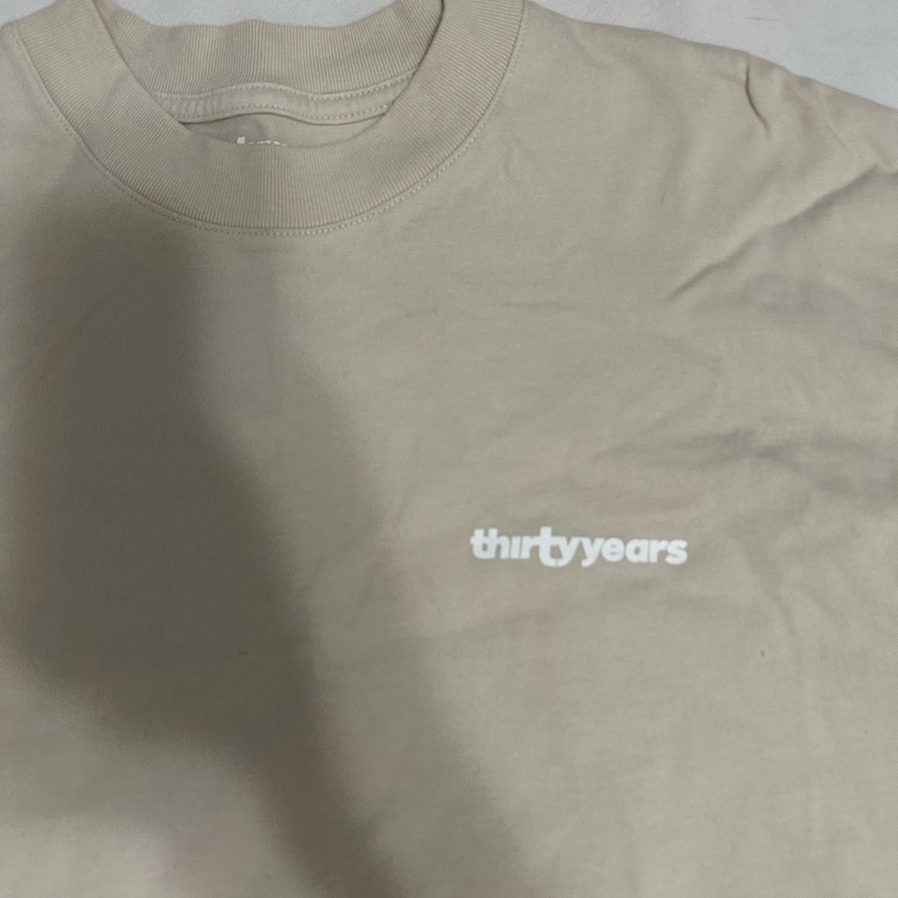 Thirty years new with tags size small